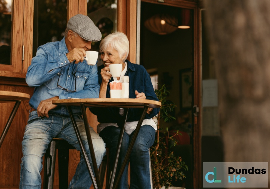 Senior Couple Relaxing at Cafe and Having Coffee