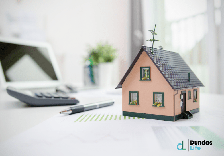 House model on desk, mortgage or house building concept