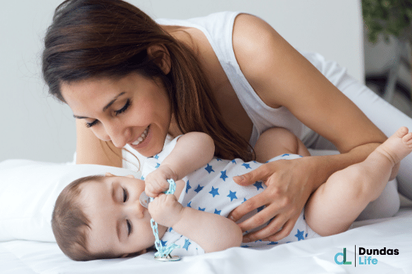 Mother playing with her child.